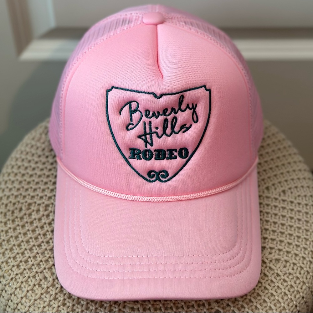 First Class Cowboys Pink Beverly Hills Rodeo Trucker
Hat🤎